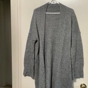 Knitted grey long sweater